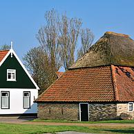 Traditional house and barn in the village Den Hoorn, Texel, the Netherlands